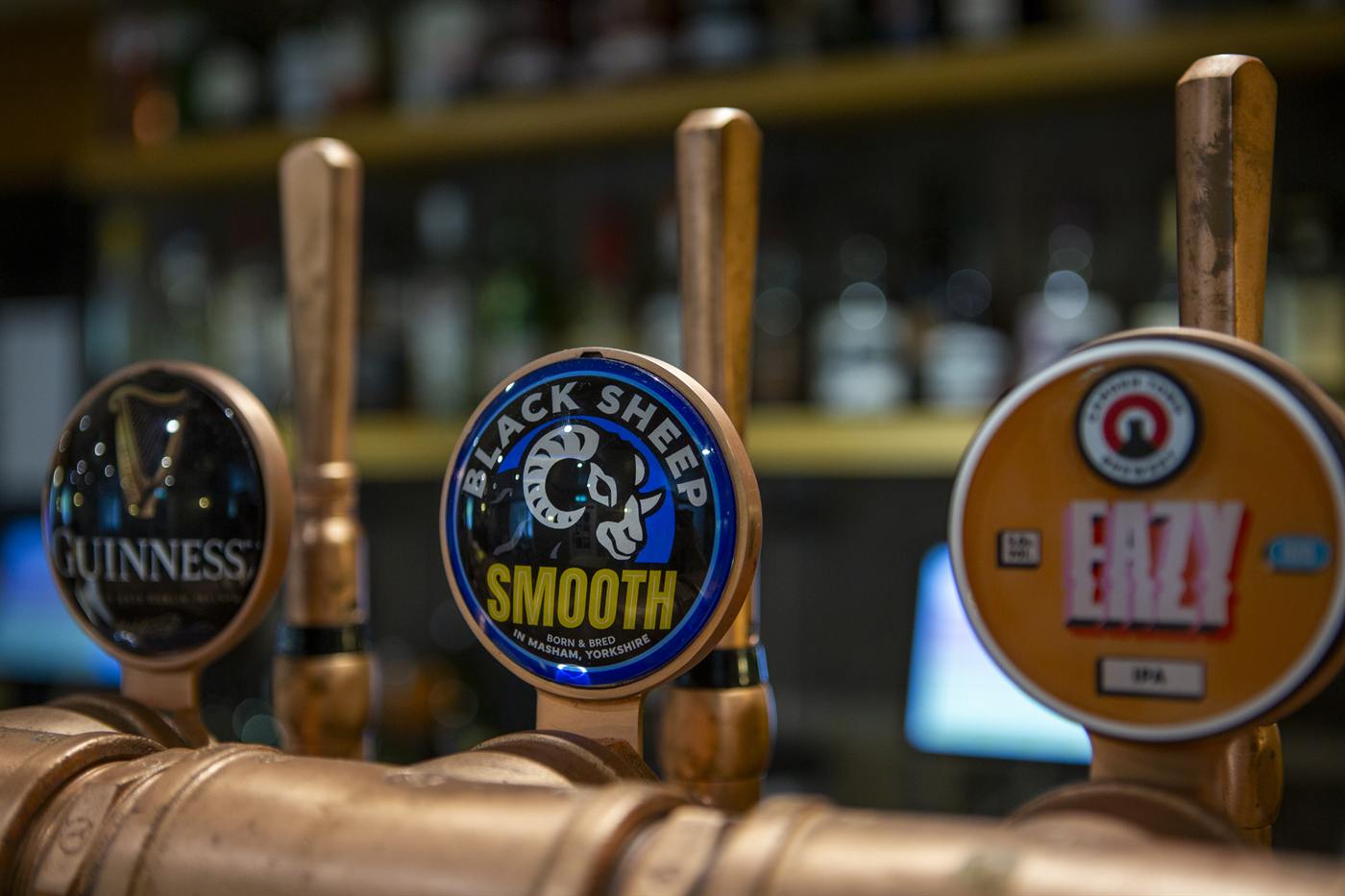Guinness, Black Sheep Smooth and other beer pumps on the bar