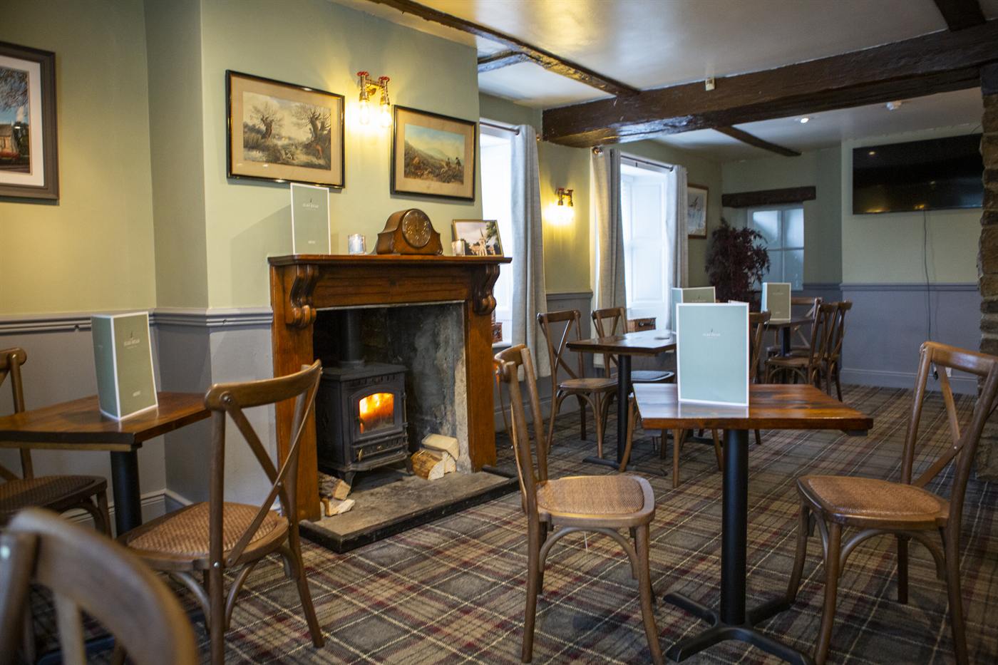 Cosy dining room with the wood burner lit