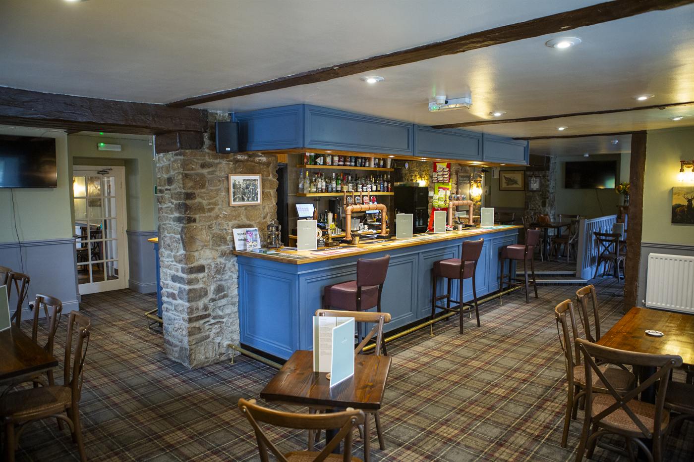 The bar and dining area with a stone pillar