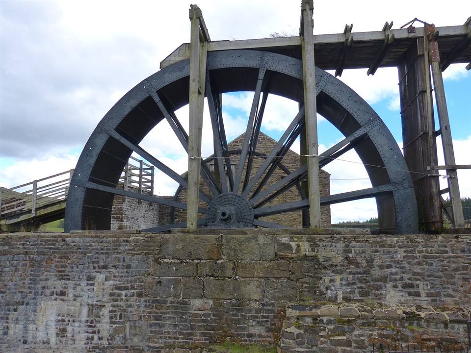 The giant red waterwheel at Killhope lead mine